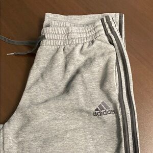 Adidas Gray Joggers with Signature Three-Stripe Design